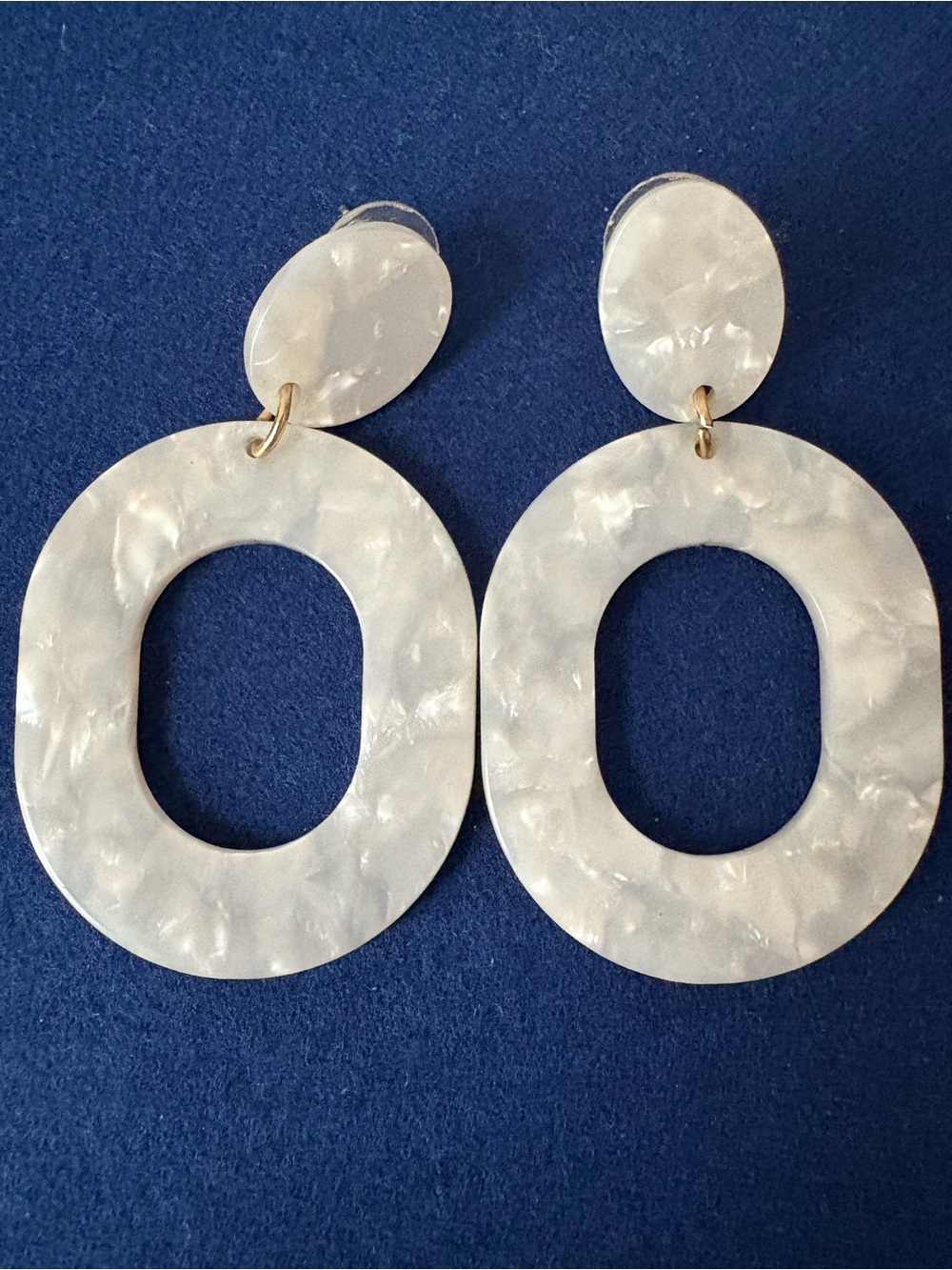Lightweight earrings , new . Minimal statement piece